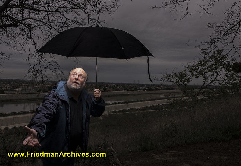 storm,stormy,skies,umbrella,wireless,flash,raining,gloomy,grey,